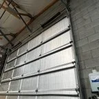 Before - Commercial Garage Door Springs and Rail Replacement for Manufacturing Facility