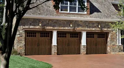 Amarr Classica carriage house style garage door on stone home